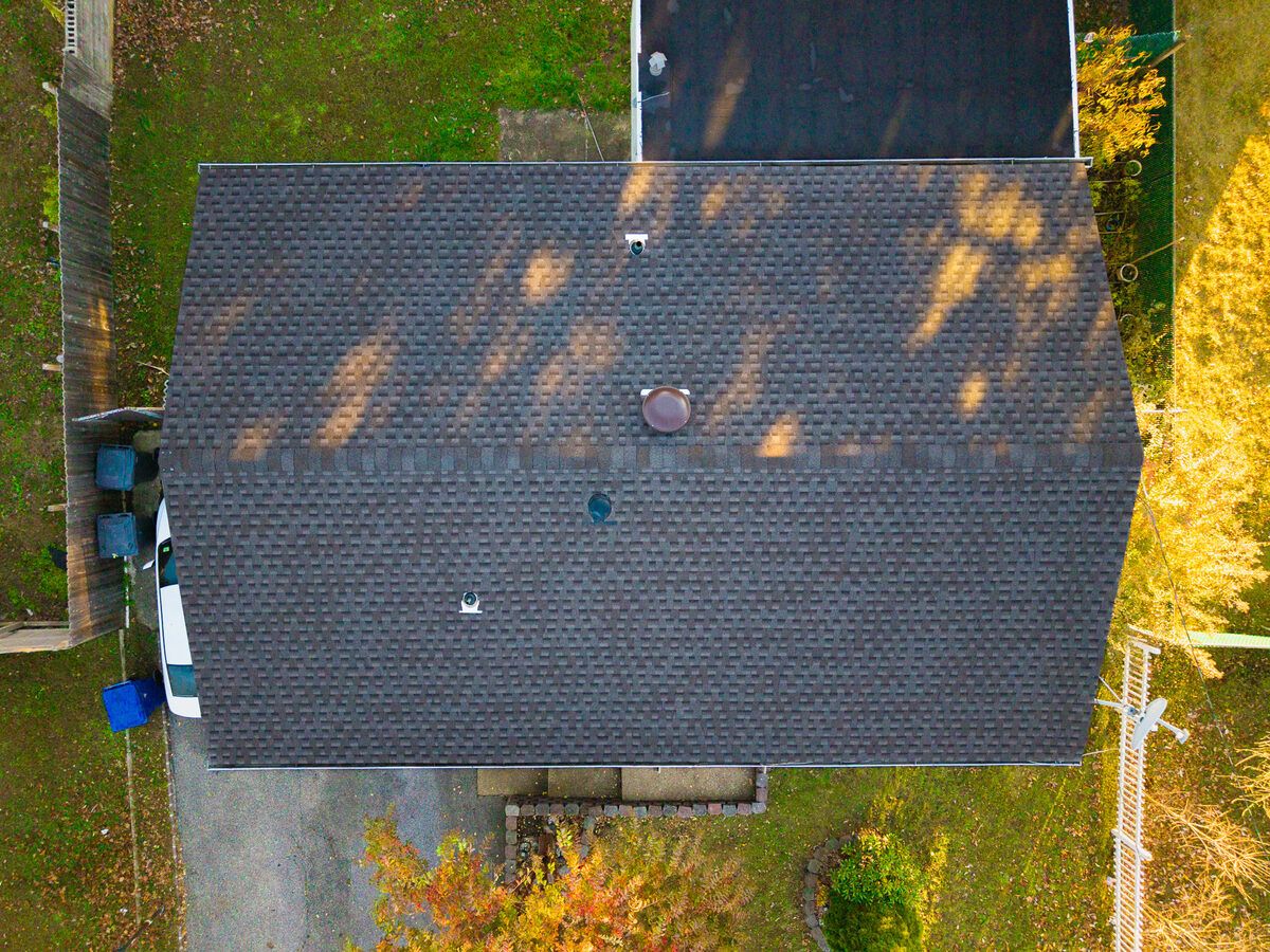 Drone photo of new roof installation on a two-story New Jersey colonial home